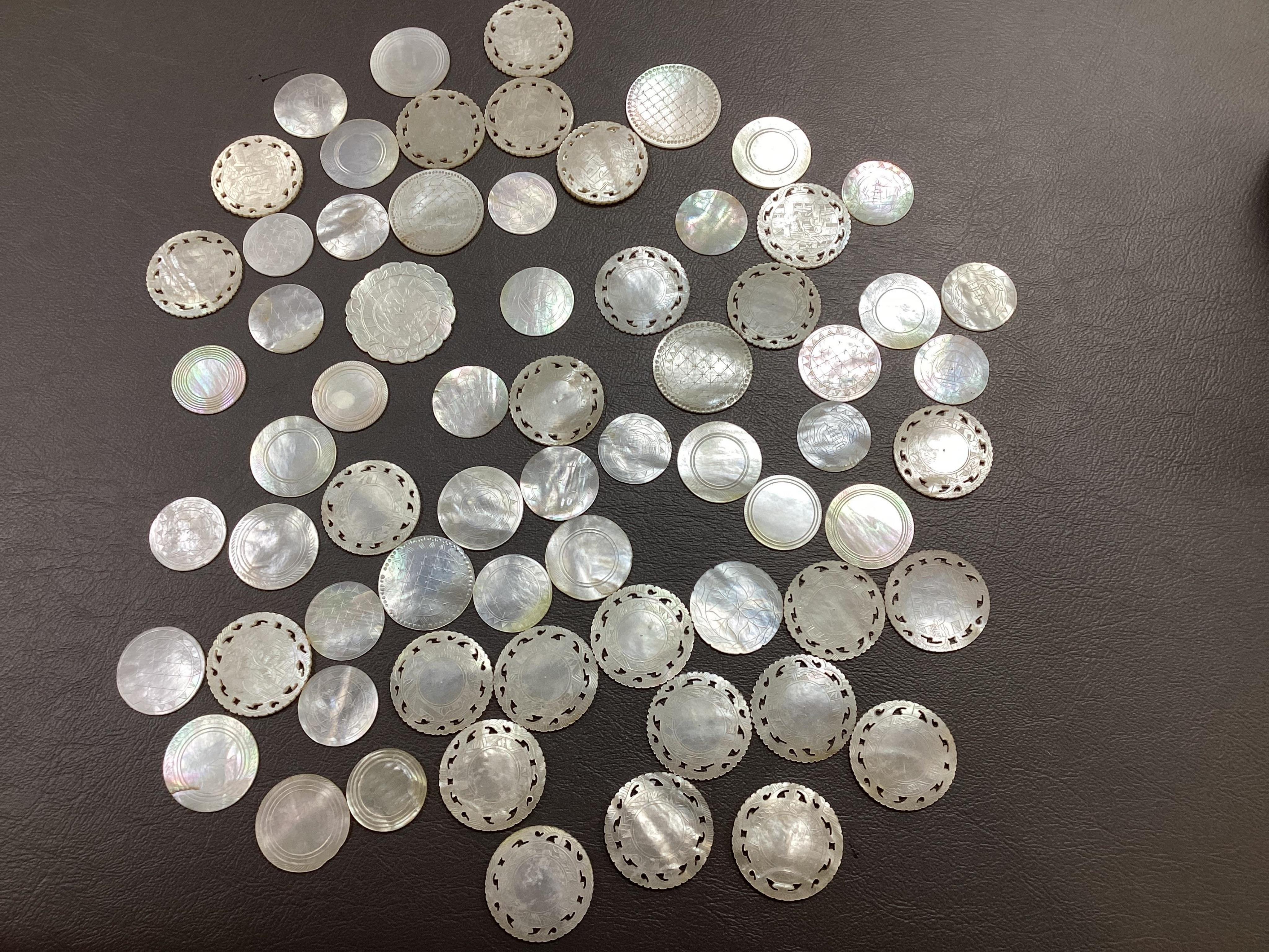 Two Chinese gilt decorated black lacquer games boxes, containing numerous mother-of-pearl counters, 19th century